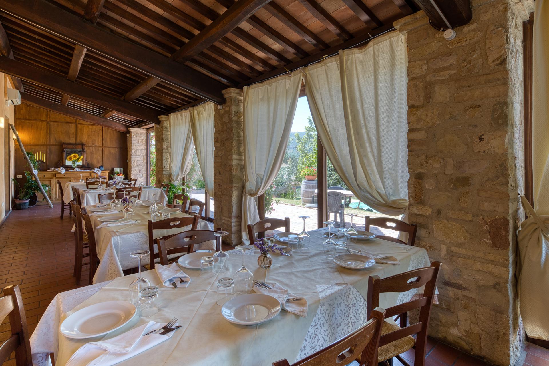A home-style restaurant serving traditional Umbrian cuisine at Agriturismo Perseo in Gualdo Cattaneo.